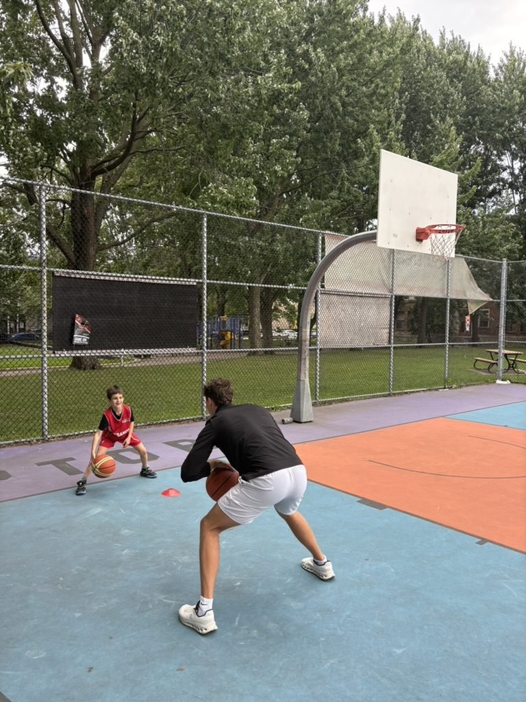 Coach demonstrating crossover